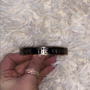 Kate Spade rose gold and black bangle